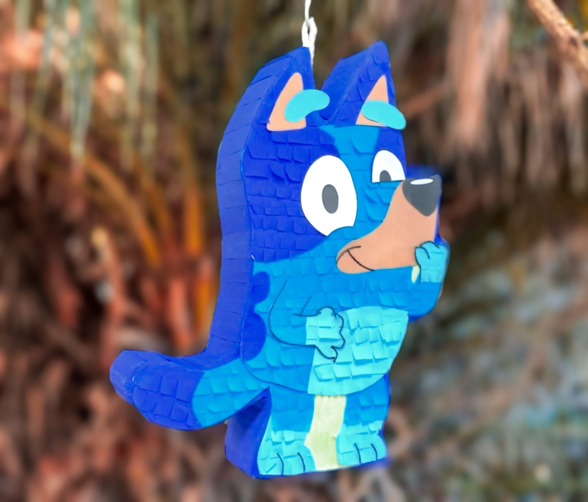 bluey piñata hanging