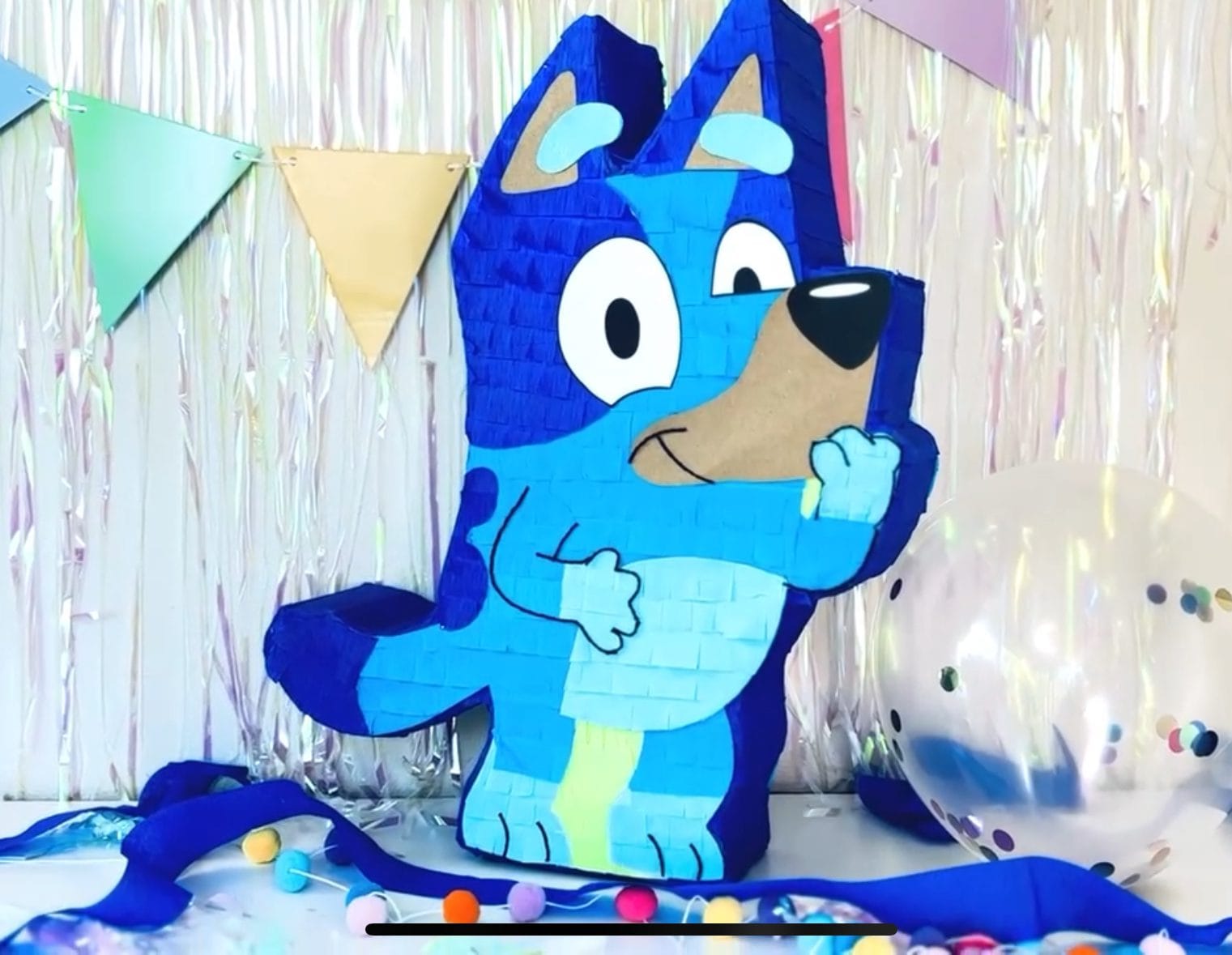 bluey piñata in party